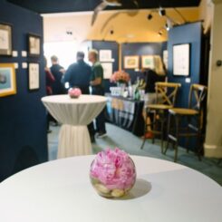 pink flowers on a cocktail table